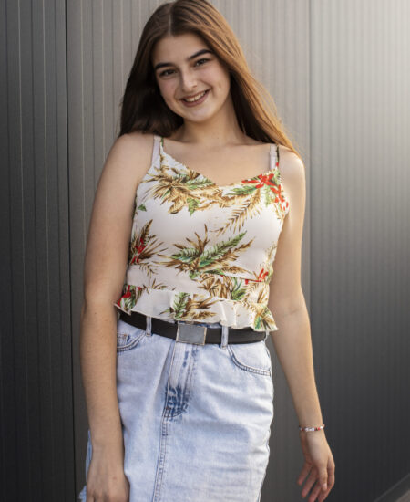 young-teenage-girl-recording-reels-herself-outdoors-social-media